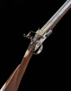 En fin og sjelden 20-hulls sølvmontert fransk D.B. Flintlock Sporting Gun, ca. 1725 av French School