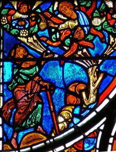 Detalj fra et vindu som viser lignelsen om den barmhjertige samaritan: Gud viser seg for Moses i en brennende busk av French School