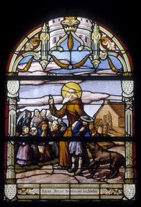 Saint Hervé velsigner de trofaste - glassmalerier i St Germain-kirken i Kerlaz av French School