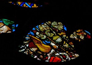 Vestrosevinduet som viser en scene fra Åpenbaringsboken: Noen av de to hundre tusen tusen (dvs. to hundre millioner) krigerne ødelegger en tredje del av menneskeheten (9:16 19). (flekk av French School