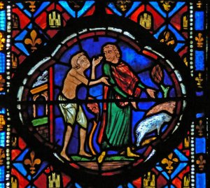 Window Ew-L som skildrer en scene fra historien om den fortapte sønnen: etter å ha brukt alle pengene sine passer han på griser og reflekterer over situasjonen hans av French School