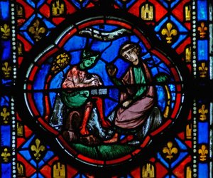 Window Ew-R som viser en scene fra Theophilus-historien: han signerer en pakt med djevelen av French School
