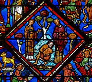 Vindu w15 som viser en scene i det barmhjertige samaritanske vinduet: pilegrimen blir ignorert av en prest og en Levi av French School