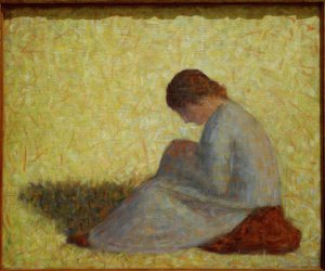 Bondekvinne sitter i gresset av Georges Seurat