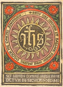 Monogram JHS i en flammende sirkel