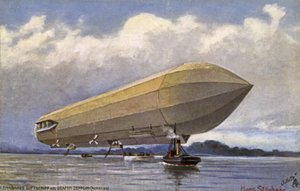 Zeppelin-luftskip tar av fra en innsjø av German School