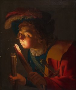 En gutt som blåser på en brann av Gerrit van Honthorst