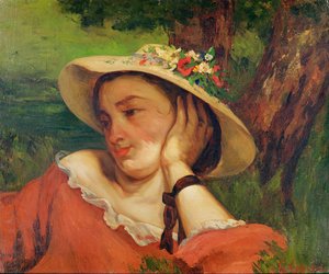 Kvinne i stråhatt med blomster, ca. 1857