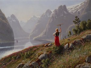 Jente med rake i fjordlandskap