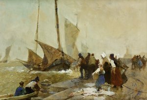 En travel kai i Bretagne med fiskebåter på retur,