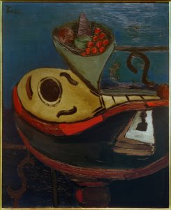 Stilleben: mandolin og bolle med frukt på et bord