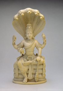Vishnu, sittende på Serpent Sesha, holder et skall, mace, plate og lotus av Indian School