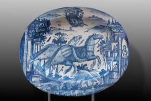Tallerken dekorert med veddeløpshester og et våpenskjold, første halvdel av 1700-tallet (majolica) av Italian School