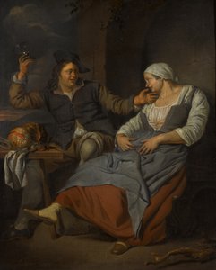 Et sittende par drikker vin