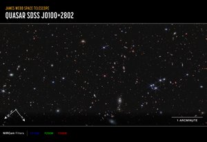Quasar J0100+2802 (NIRCam Compass Image) av James Webb Space Telescope (NASA)