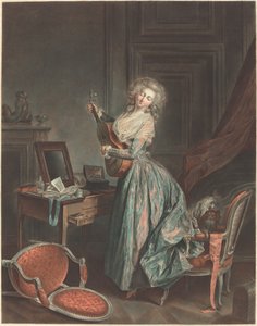 En kvinne som spiller gitar