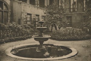 Ancient Mulberry Tree and Fountain in the Garden of Drapers Hall, c1935.