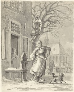 En hushjelp rydder snø til et hus