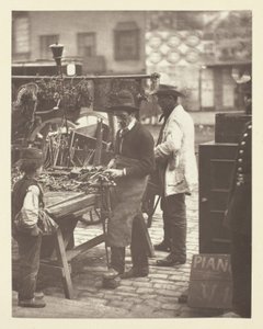 Gatelåsesmeden av John Thomson