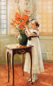 En ung jente som arrangerer vårblomster