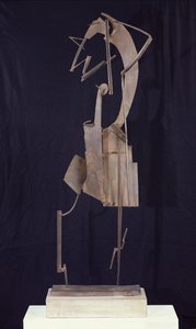 Kvinne som ordner håret, 1929-30 (metall)