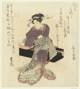 Geisha knytter beltet på seg av Kurizono