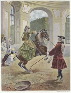 En kvinne som rir på en hest som reiser seg foran en mann som holder en pisk