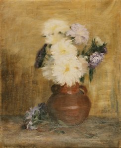 Asters i en steintøymugge på et bord,