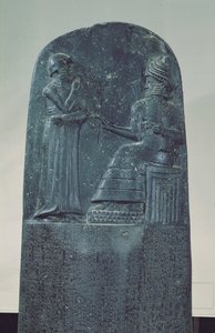 Reliefffigur av solguden Shamash som dikterer lovene hans til kong Hammurabi på hans berømte lovkode, gammel babylonsk periode, 1760 f.Kr. (basalt) av Mesopotamian