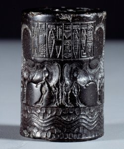 Mesopotamia: sylindrisk segl i svart marmor i navnet til den guddommelige Sharkali-Sharri (Shakalisharri), kongen av Agade pryder med helter som vanner bøfler. 2300 f.Kr. Paris, Louvre-museet av Mesopotamian Mesopotamian