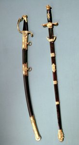 Minnesverd gitt av Napoleon Bonaparte for å ha hjulpet ham med hans vellykkede statskupp ved Saint Cloud den 18. brumaire an 8 (9. november 1799) og et tveegget sverd til en general-befal (meg)