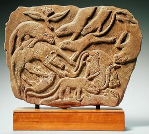 Relieff som viser hunder som feller en ku, 4.-5. århundre (sandstein) av Nubian Nubian