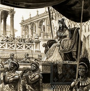 Cleopatra blir båret på et kull