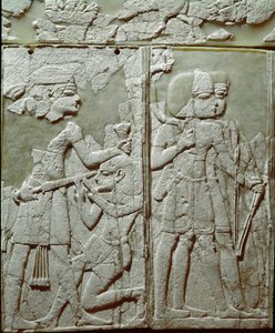 Fønikisk sivilisasjon: sengepynt med lavt elfenbensrelieff som representerer en kongetruende fiende. Fra stedet til Ugarit eller Ugarit, gammel syrisk sitat på Tell de Ras Shamra. 1300-tallet f.Kr. Søn 24 cm Damaskus, Nasjonalt arkeologisk museum Syr av Phoenician