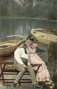 Jente som justerer barten til en korpulent mann (fargebilde) av Photographer German
