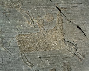 Forhistorie, Camunni-sivilisasjon, bergkunst: gravstein som viser en kriger på hesteryggen med et skjold. Periode mellom yngre steinalder og bronsealder. Capo di Ponte, Naquane helleristninger nasjonalpark, Valcamonica, Val Camonica, Italia av Prehistoric Prehistoric