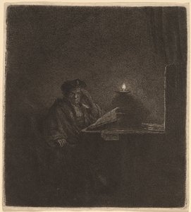 Student ved et bord ved levende lys av Rembrandt van Rijn