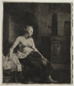 Kvinne som sitter halvkledd ved siden av en komfyr av Rembrandt van Rijn