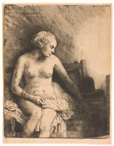Kvinne på badet, med en lue ved siden av seg av Rembrandt van Rijn