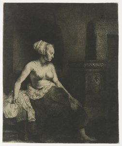 Kvinne som sitter halvkledd ved siden av en komfyr av Rembrandt van Rijn