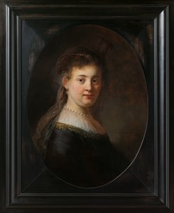 Ung kvinne i fantasykostyme av Rembrandt van Rijn