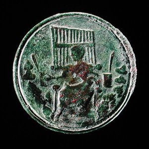 Romersk mynt som viser et orgel (bronse) av Roman