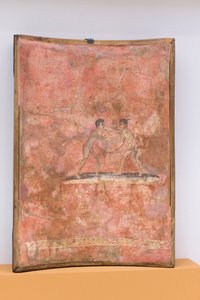 Kampscene med idrettsutøvere på rød bakgrunn av Roman Roman