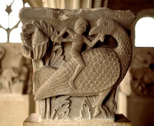 Representasjon av en kamp mellom en mann og en fugl (utskåret hovedstad i kapittelhuset) av Romanesque