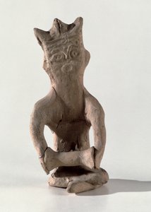 Kryssbenet figur med en gjenstand antatt å være en tromme, fra Susa, Iran, 4.–6. århundre e.Kr. (bein)