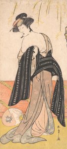 Skuespilleren Nakamura Riko som en Oiran som binder hennes Obi, ca. 1779.
