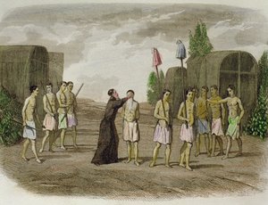 En urfolksslave av Tupinamba-stammen blir døpt av en jesuittprest, nær Bahia i 1550 av Spanish School