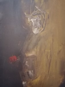 Kontemplativ figur med rødt eple av Stefano Mazzolini