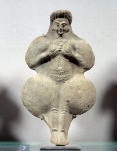 Orientalsk kunst: terrakottastatuett av kvinne som holder brystene hennes, sannsynlig representasjon av Ishtar, fruktbarhetsgudinnen. Fra Susa. Iran. Elamitt periode. 14.-12. århundre f.Kr. Søn 0,16 m. Museet Louvre