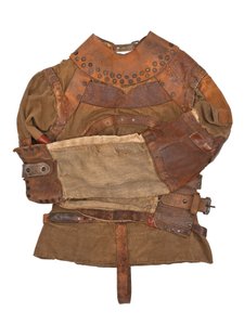 Tvangstrøye eid av Harry Houdini, ca. 1915 (khaki lerret, lær og metallnagler) av Swanfeldt Tent and Awning Co.